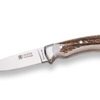 CUCHILLO DE MONTE ENTERIZO CON VIROLA CACHAS EN ASTA DE CIERVO Y HOJA DE 12 CM
